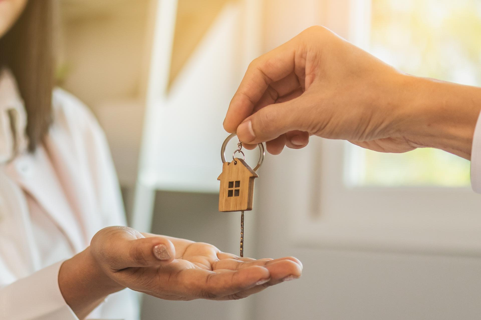 Client receiving keys of her new house